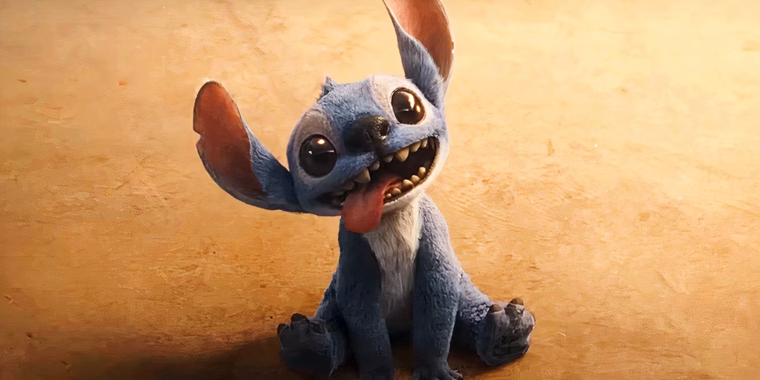 ‘Lilo & Stitch’ Is an Adorable Live-Action Remake that’s BETTER Than Most – Movie Review Stitch sitting on the ground making a silly face in Lilo and Stitch live action